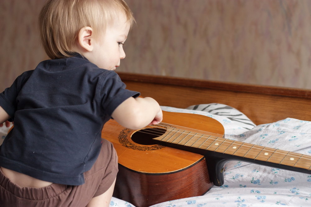 Child playing with a guitar - Николай Н