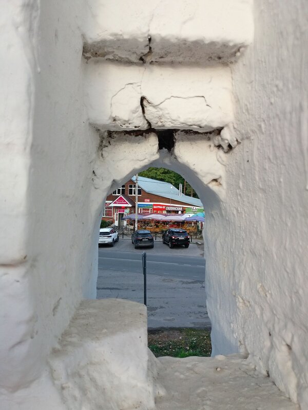 Взгляд через бойницы в древней крепостной стене монастыря - Galina Solovova