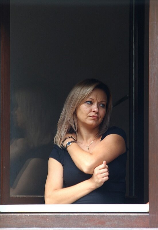 Женщина во окне - Юрий. Шмаков