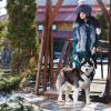 Serious woman in a fur hat with a Husky dog :: Алексей Камнев