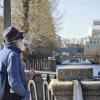 Мужчина стоит на одном из мостов "Семимостья" :: Галина Бельченко