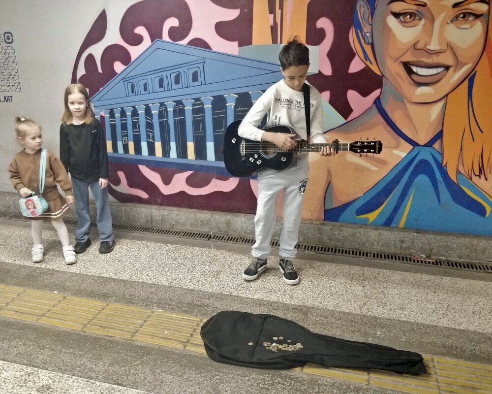 Гитарист - Андрей Хлопонин