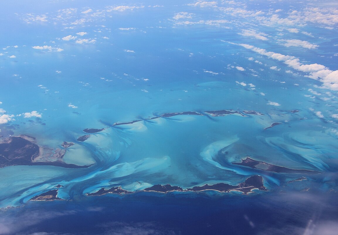 Ожерелье Багамских островов (вид из окна самолета) - unix (Илья Утропов) Ожерелье Багамских островов (вид из окна самолета) - unix (Илья Утропов)